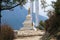 Typical white stone tibetan buddhist stupa in Himalayas