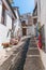 Typical white street of Pampaneira village in Spain