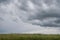 Typical wild landscape in Brittany with amazing dark cloudy sky, unique desolate countryside with nobody