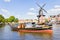 Typical windmill and medieval architecture in Haarlem, Netherlands