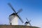 Typical windmill in with the moon at the background