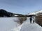 A typical winter idyll on the frozen and snow-covered alpine lake Heidsee (Igl Lai) in the winter resort Lenzerheide