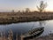 Typical wooden boat of the wetland known as Padule di Fucecchio, Porto dell'Uggia, Tuscany, Italy, at sunset