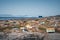 Typical wooden colourful blue fisher house with iceberg in Disko bay area Greenland and Ilulissat. Typical architecture