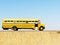 Typical yellow school bus for transfer of labor personnel in the desert of saudi arabia.