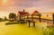 Typically traditional Dutch house, windmill, historical architecture and bridge over water at the Zaanse Schans