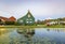 Typically traditional Dutch house, windmill, historical architecture and bridge over water at the Zaanse Schans