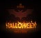 Typography Halloween  party poster with burning letters and bat silhouette. Halloween background