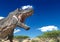 Tyrannosaurus is angry and alone on desert close up