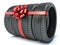 Tyres with a red ribbon. Present. 3D