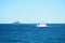 Tyrrhenian sea, blue sea waves, boat and horizon, landscape