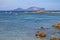 Tyrrhenian Sea with yachts offshore Isola Tavolara island with Capo Figari cape, Monte Ruju peak and Golfo Aranchi gulf off