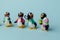 Tyumen, Russia-February 15, 2023: Kinder surprise toy penguins. Manufactured by Italian Ferrero. Close-up