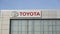 Tyumen, Russia-March 02, 2024: Toyota brand logo sign prominently displayed on the side of a commercial building in a