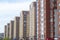 Tyumen, Russia, on May 8, 2019: Inhabited brick high houses stand in a row