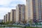 Tyumen, Russia, on May 8, 2019: Inhabited brick high houses stand in a row