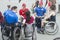 Tyumen, Russia, on May 9, 2019: Disabled people wheelchair invalids communicate with each other