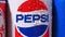 Tyumen, Russia-November 01, 2020: Pepsi logo metal can. Classic red blue and white logo pepsico close up.