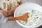 Tzatziki with herbs, chili and poppyseed crackers