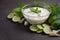 Tzatziki sauce and ingredients. Fresh cucumber and dill sauce and ingredients.