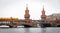 U-Bahn train passing over Oberbaum Bridge in Berlin, Germany