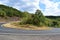 U-curve of a mountain road in the HunsrÃ¼ck, south side of Mosel valley