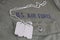 U.S. AIR FORCE Branch Tape with dog tags on olive green uniform