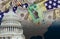 U.S. Capitol in Washington D.C. with Coronavirus financial a stimulus bill individual checks from government USA dollar cash