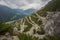 U-shape curved road towards Towers of Fraele, a touristic attraction in North Valtellina, Italy