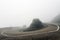 The U-turn corner at Tai mo shan in a foggy morning