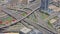 UAE, Dubai - United Arab Emirates 01 April 2024 Time lapse Aerial View of Dubai's Multilevel Highway Intersections