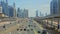 UAE, Dubai - United Arab Emirates 01 April 2024 Time lapse Busy Highway Street Scene in Urban Dubai, Traffic flows on a