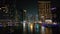 UAE, Dubai - United Arab Emirates 01 April 2024 Time lapse Dubai Marina Waterfront at Night, Glittering night view of