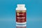 Ubiquinol coQ10 coenzyme q10 supplement softgels in the jar. dietary supplement editorial photo