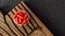 Ubiquinol supplement softgels on a wooden desk. dietary supplements top view. mental wellbeing and personal health concept