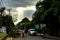 Ubud Bali Street Scene with sunrays and people walking