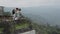 Ubud City, Bali Island Country Indonesia 12/03/2020. Tourists take selfies on the observation deck, on the background of the volca