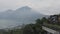 Ubud City, Bali Island Country Indonesia 12/03/2020. Tourists take selfies on the observation deck, on the background of the volca