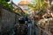 Ubud\'s Vibrance: People on Motorcycle Exploring Bali\'s Charming Side Streets