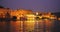 Udaipur City Palace and Lal ghat on bank of lake Pichola in twilight at Udaipur, India.