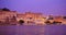 Udaipur Lal ghat, houses and City Palace on bank of lake Pichola with water riffles. Rajasthan. Sunset at Udaipur, India
