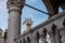 Udine - Columns of Loggia del Lionello with scenic view of Venetian style clock tower Torre dell\\\'Orologio