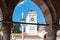 Udine - Columns of Loggia del Lionello with scenic view of Venetian style clock tower Torre dell\\\'Orologio