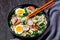 Udon noodle soup in a bowl, top view, close-up