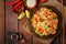 Udon pasta with shrimp, tomatoes and paprika.