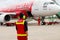 UDON THANI, THAILAND - OCTOBER 6, 2015: Air Asia staff on ground in the airport