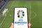 UEFA Euro 2024 Germany European Football Championship Europe logo on a mobile photomontage in Germany