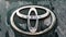 UFA, RUSSIA - 23 June 2019: closeup Toyota rear car with sign logo of Toyota on dirty dark green Land Cruiser Prado car. Toyota