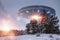 UFO, alien saucer hovering over the winter landscape in the sky. Unidentified flying object, alien invasion, extraterrestrial life