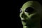 UFO and extraterrestrial life encounter of third degree concept theme with close up on the face of a green alien with high